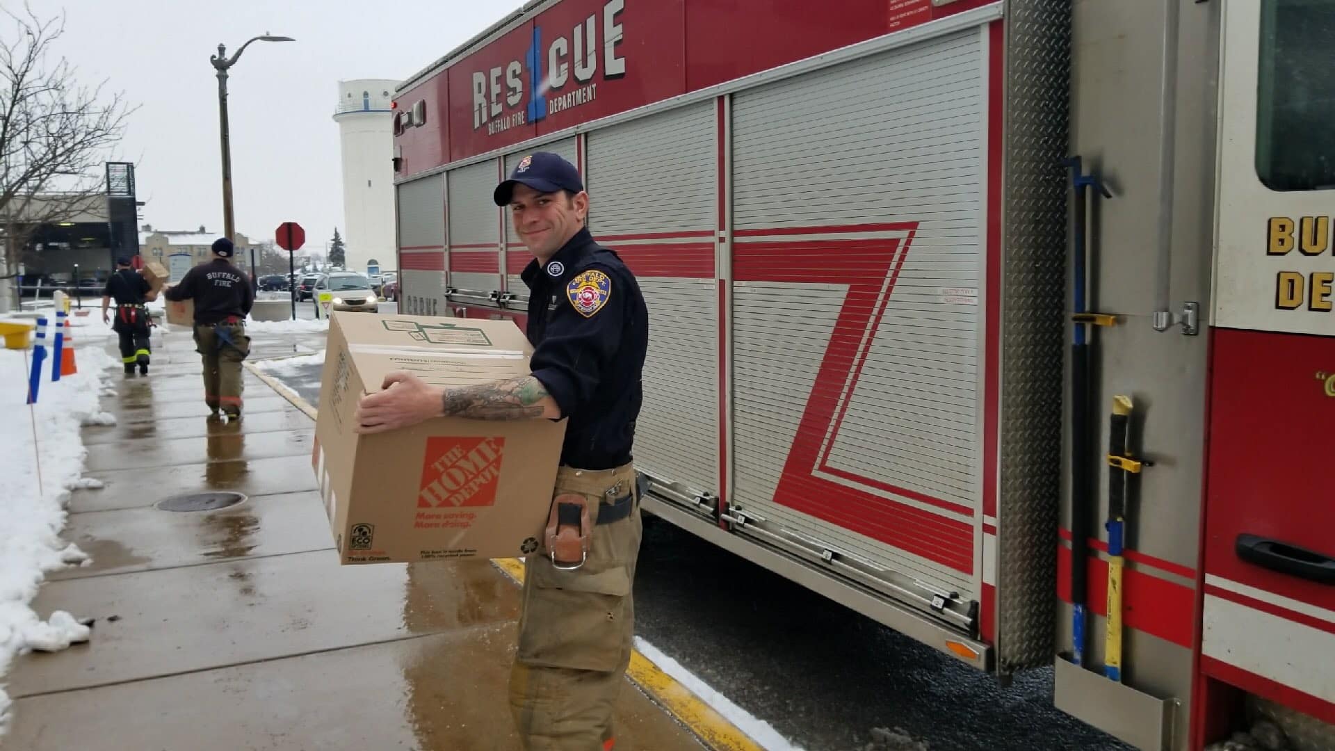 Heroes helping heroes: Buffalo Firefighters bring cases of popcorn to veterans at the VA