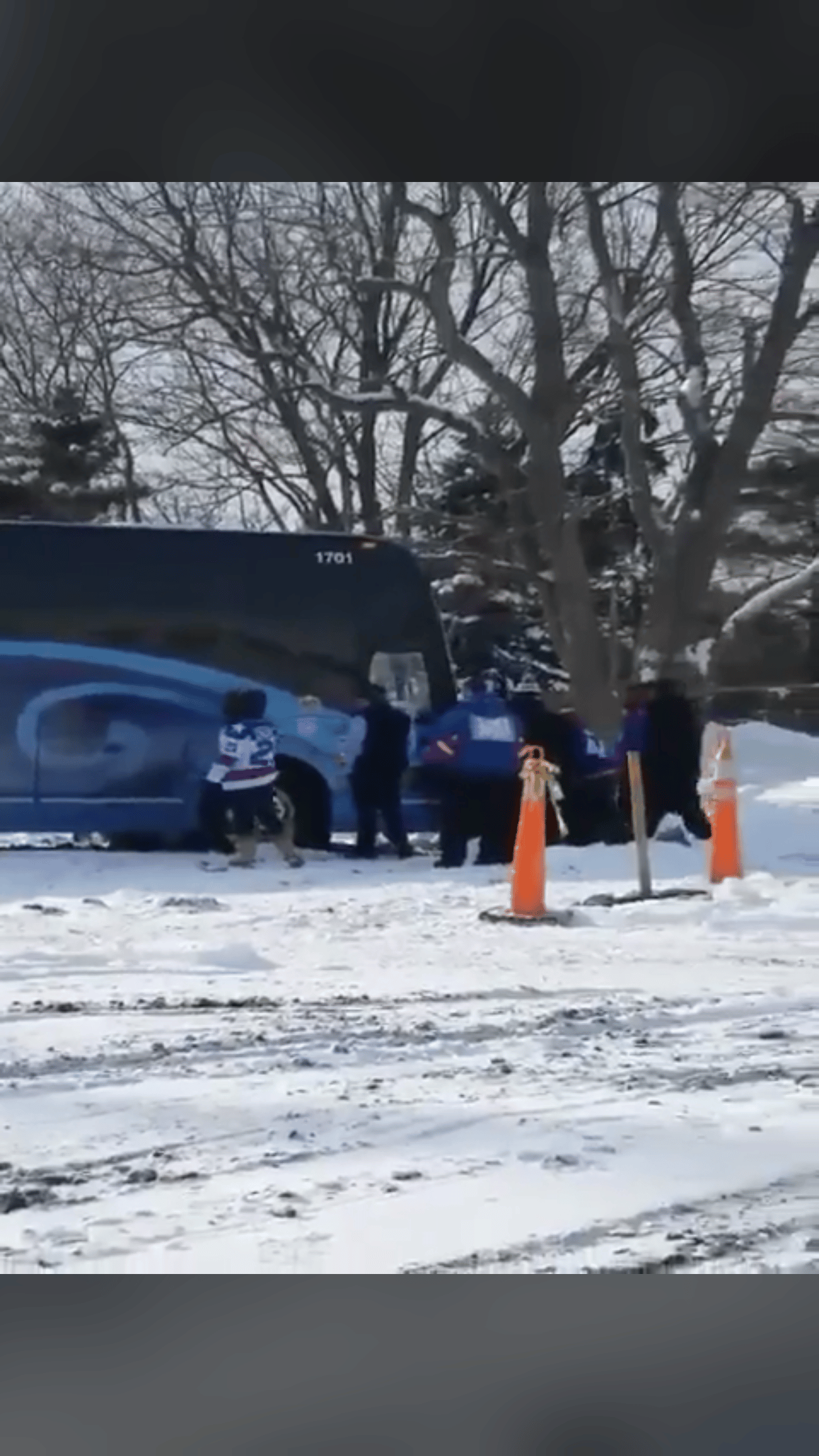 Team USA hockey bus gets stuck – luckily they’re in the City of Good Neighbors