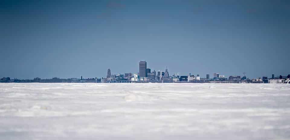 Buffalo skyline over a frozen lake in winter