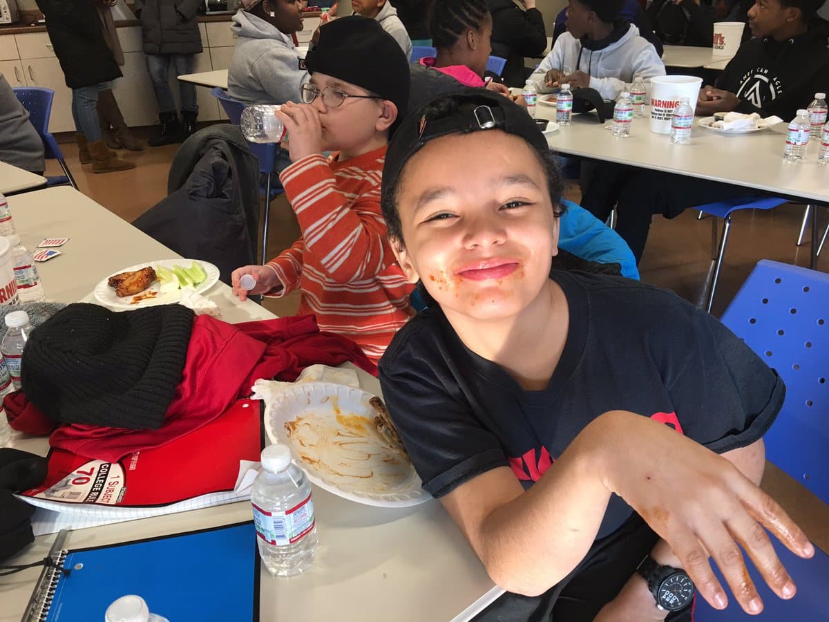 Special kids and families are feasting on Buffalo Thank-You Wings sent to Cincinnati – and look who’s serving them!