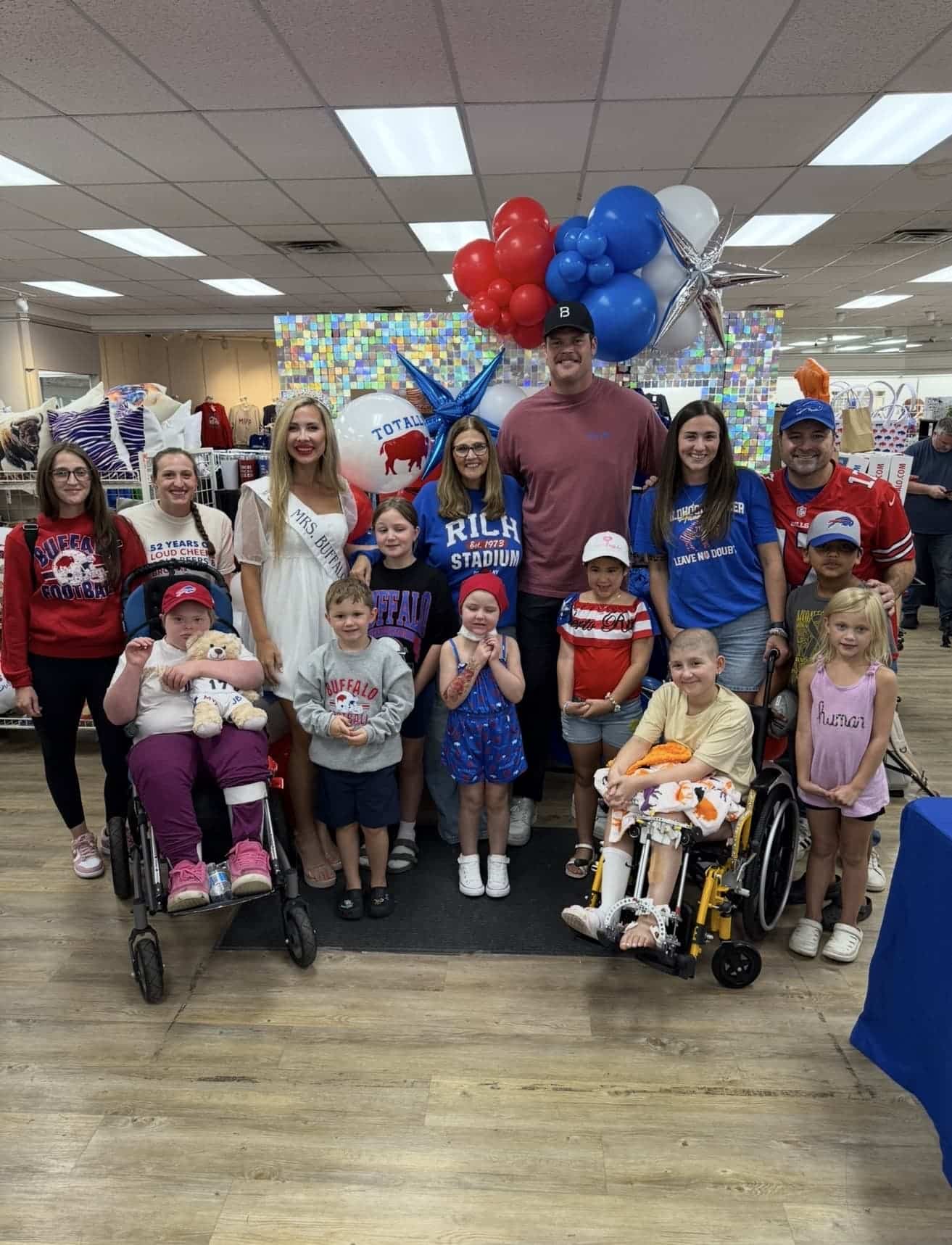 Totally Buffalo Cares community gathering with balloons and families