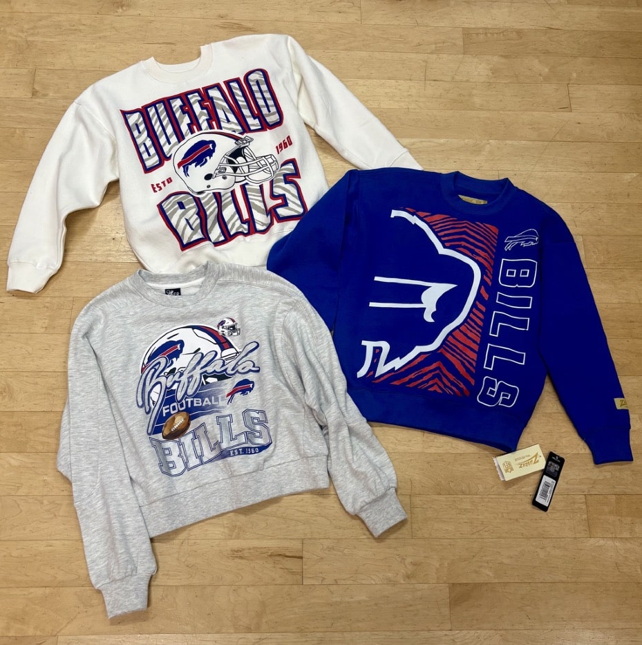 Folded Buffalo Bills apparel on the store floor